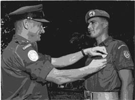Signalman Thomas W. Mulholland receiving the UNOC Service Medal in 1962